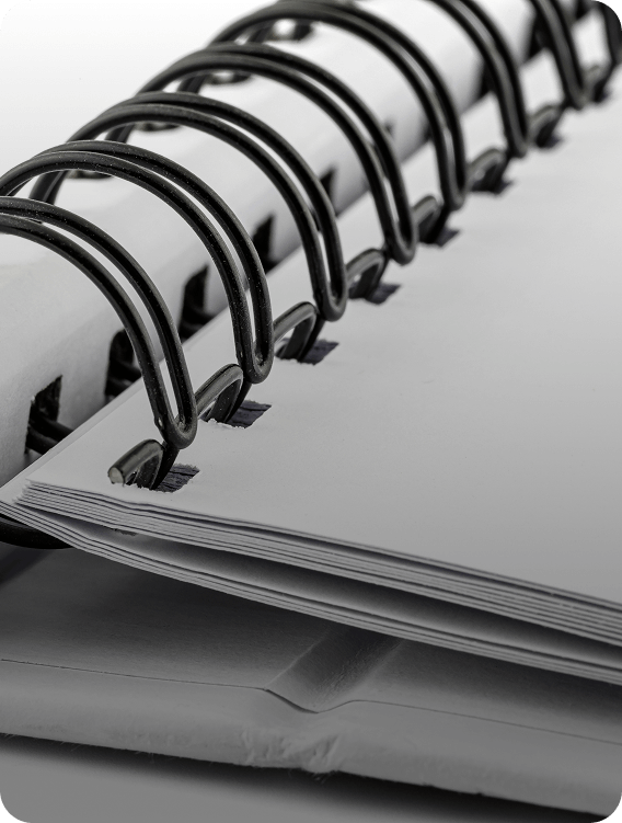 Close-up of a black spiral bound document